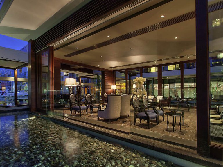 Sofitel Auckland Viaduct Hotel exterior overlooking the harbor